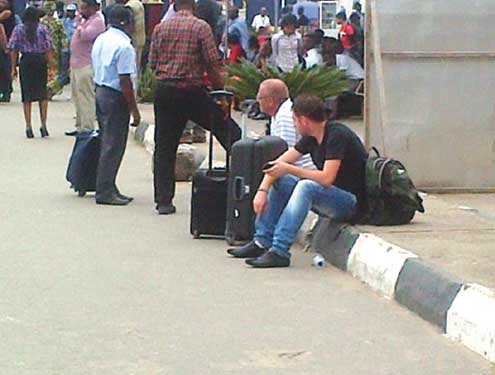 Arik Air passengers stranded this morning at GAT, Ikeja, Lagos. Photo: Simon Ateba.