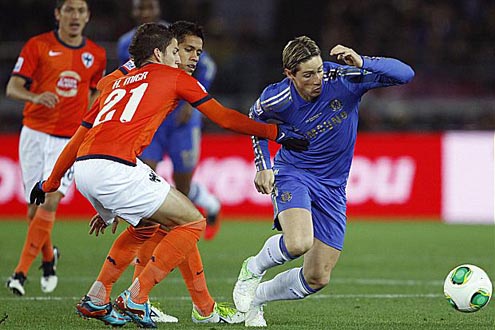 Torres r moves ahead of Monterrey players during the club world cup match on Thursday