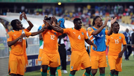 Ivory Coast team celebrate victory over Togo