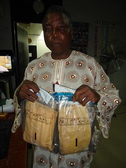 Latest arrest: fatoke abiodun with the 2 wraps of cocaine