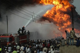 firemen battle an oil pipeline fire in Lagos