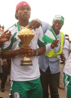 A Nigerian feels the coveted Cup