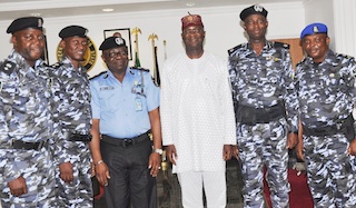 All the newly promoted cops, manko and Fashola