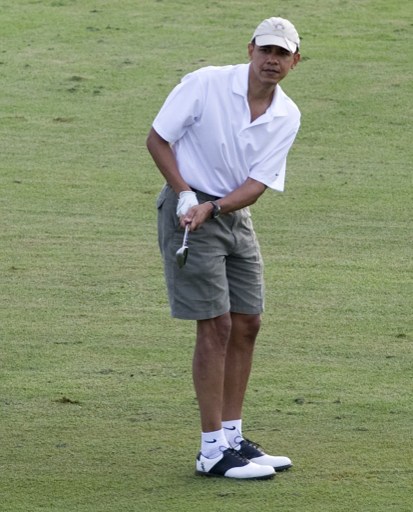 File photo- barack Obama playing golf