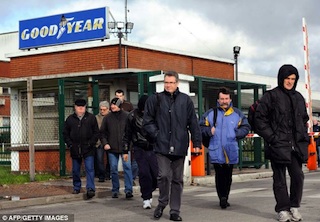 French workers leaving the Goodyear plant. AFP