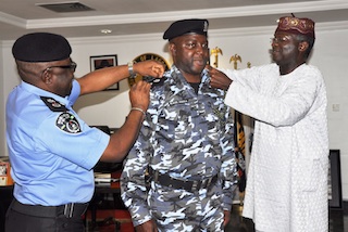 Olajide Agboola, deputy commander task force also being decorated by Governor Fashola and Compol Manko