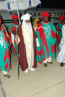 The Emir of Kano, Alhaji Ado Abdullahi Bayero stepping out from the Nigeria Air Force