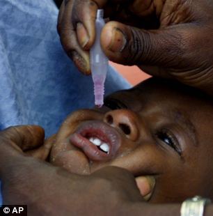 A polio vaccinator at work