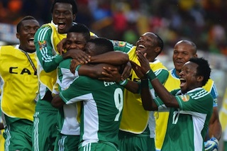 jubilant Nigerian players after Emenike’s goal