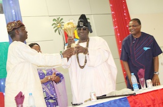 File Photo: Fashola and Oba Akiolu at an event: 120 cars for Lagos monarchs in 2014