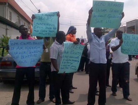 Aero Contractors staff protesting at their company's headquarters on Monday morning. Photo... Simon Ateba