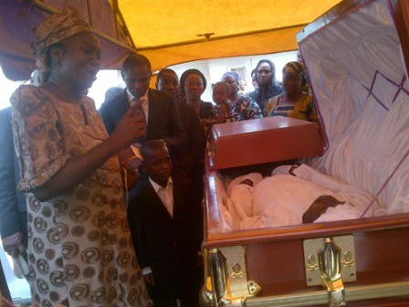 Cecilia Adedeji, her kids and other mourners at the burial of Ademola Adedeji today at Mowe. PHOTO: SIMON ATEBA.