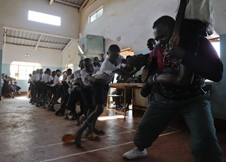Conrad Njeru Karukenya: in a tug of war with pupils of Tenri primary school ih his hometown of Embu
