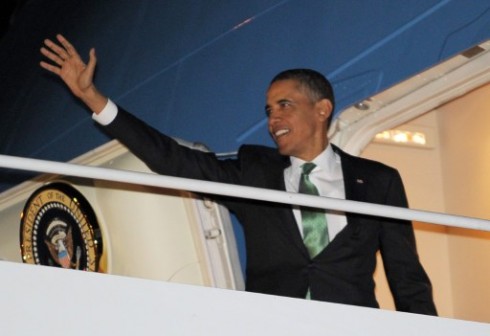 Obama: aboard Air Force One. AFP Photo