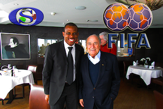 Oliseh, left, with FIFA president Sepp Blatter at a recent funstion