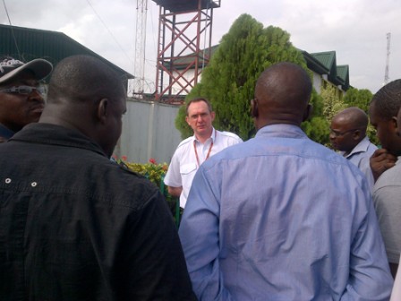 Rolf Kaeselau, Technical Manager at Aero Contractors, addressing striking workers at Aero Headquarters in Lagos. Photo: Simon Ateba