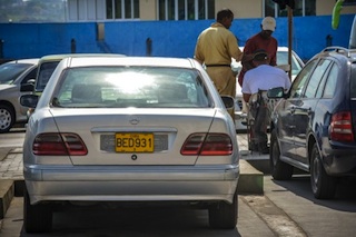 Cuba: Mercedes Benz car parked in Havana