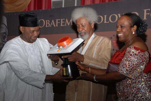 (L) Vice President Namadi Sambo,presenting Obafemi Awolowo,Prize for Leadership Award 2012 to Prof Wole Soyinka while Dr Tokunbo Awolowo-Dosumu, looks on yesterday in Lagos. Photo Idowu Ogunleye.