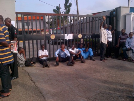 The striking Aero Contractors workers who blocked the entrance gate of the company