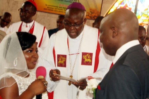 I do: the couple at the wedding at Methodist Church, Opebi in Lagos. Photo Joseph Oluwasanmi