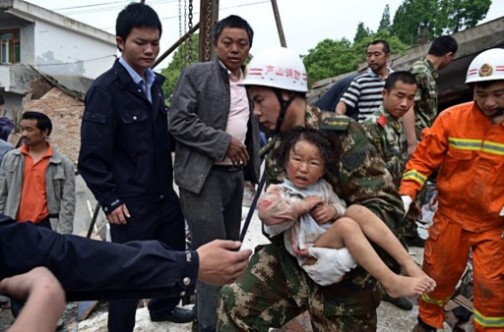  a-child-being-rescued-from-the-rubble. AFP photo