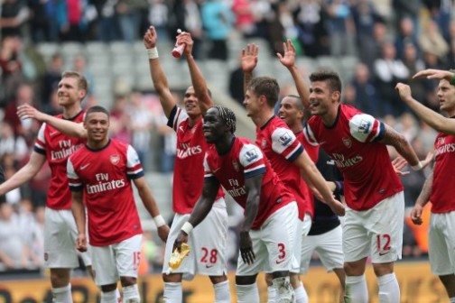 Arsenal players celebrate: will they beat Liverpool today