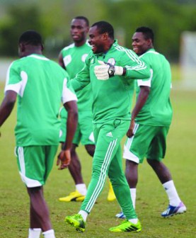 Super Eagles' home-based player, Kunle Odunlami (right) with other members of the team before a training session at the Houston Amateur Sports Park Thursday ahead of their friendly match against Mexico in the early hours of Saturday in Houston, Texas, United States.