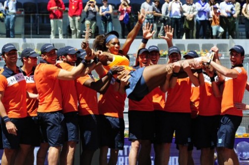 US player Serena Williams celebrates after winning the women's singles final tennis match of the Madrid Masters against Russian player Maria Sharapova 