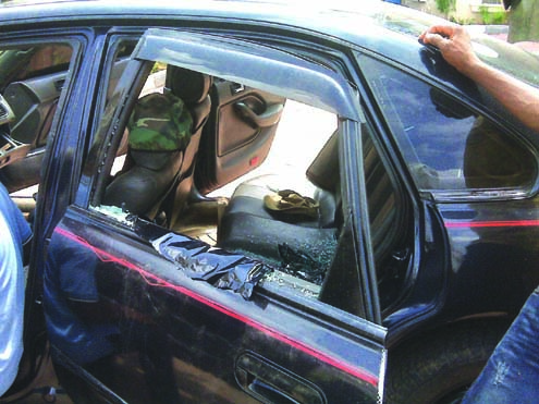 car destroyed by robbers in hotel
