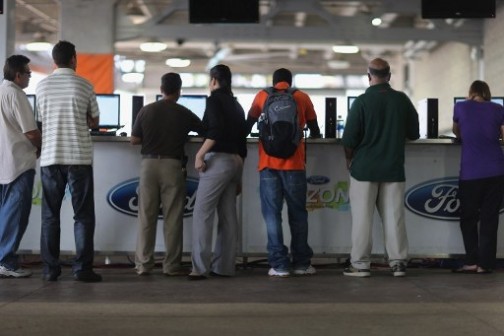 People looking for jobs at Job Fair Held At Sun Life Stadium In Miami. 
