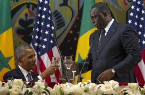 A toast for Africa: US President Obama with Senegal's President Macky Sall. AFP