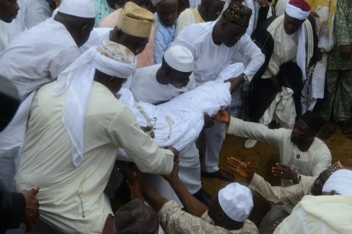 Abibat Mogaji being lowered to the grave