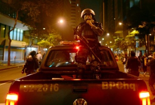 Brazil's Riot police officers confront demonstrators after clashes erupted during a protest against corruption and price hikes, on June 20, 2013, in Rio de Janeiro as the FIFA Confederations Cup Brazil 2013 is being held in the country. AFP