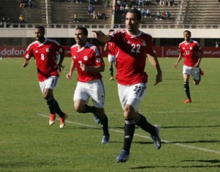 Egypt's striker Aboutrika Salaire (2nd R) celebrates with his teammates after scoring the opening goal of their 2014 World Cup qualifier match against Zimbabwe
