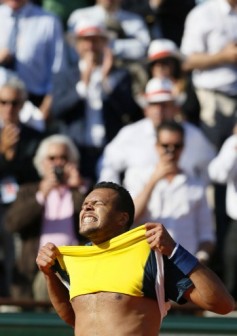 France's Jo-Wilfried Tsonga celebrates victory over Federer