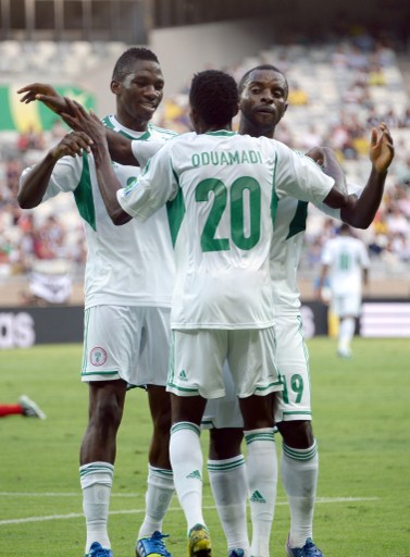 Nigerian players celebrate a goal