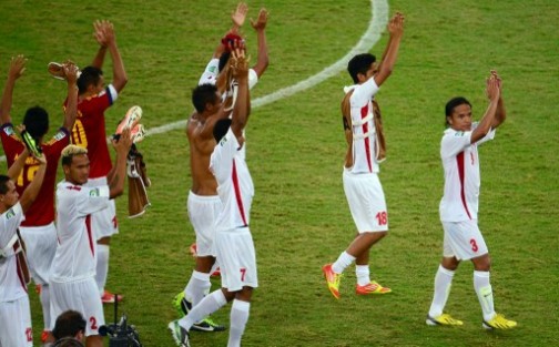 Spirit of sportsmanship: Tahiti players acknowledging cheers from the crowd