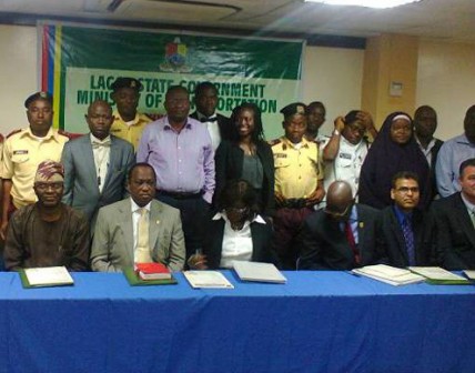 L-R (Seated): Kayode Opeifa, HOS, Adesegun Ogunleye, Florence Oguntuase; Permanent Secretary, Ministry of Transport, Oluseyi Coker, facilitators and some of the participants at the training workshop.