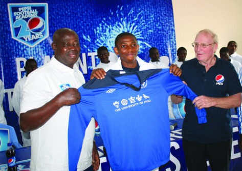 L - R: Director of Pepsi Football Academy, Dr. Kasimawo Laloko; selected Pepsi Academy student for UK Scholarship, Mba Chigozie, Consultant to Pepsi Football Academy, Mr. Iain Nelson at the end of Pepsi Football Academy UK scholarship selection at Agege Stadium, Lagos.