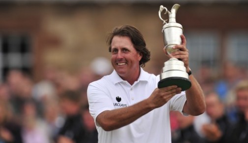 US golfer Phil Mickelson holds the Claret Jug 
