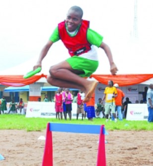 One of the kids demonstrating at the launch of Nestle/IAAF Kids' Athletics programme at Opebi Primary School, Ikeja, yesterday. PHOTO: Emmanuel Uwasi.