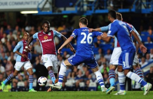 Aston Villa's Belgian striker Christian Benteke (L) vies with Chelsea's English defender John Terry (2nd L) during the English Premier League football match between Chelsea and Aston Villa at Stamford Bridge in London on August 21, 2013.