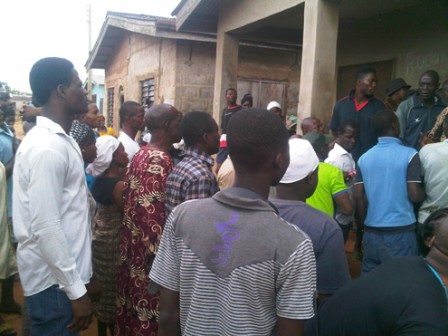 Crowd in front of the house