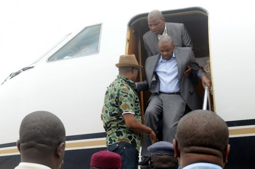 Governor Suntai being helped to disembark in Abuja