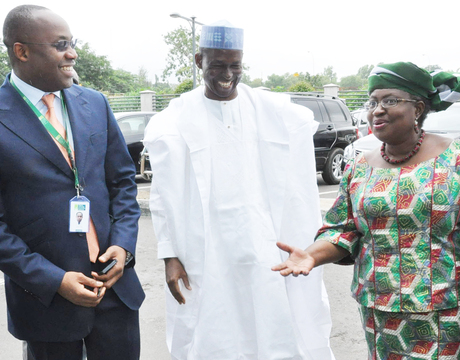OKonjo Iweala, right, with officials of NSIA in Abuja
