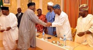 President Jonathan greets Ebenezer Babatope