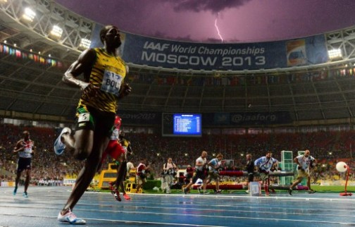 The famed photo that captures a lightning in the horizon as Bolt wins the 100m in Moscow. AFP photo