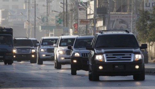 A UN convoy of vehicles, carrying inspectors investigating allegations of the Syrian regime's use of chemical weapons, drives through the Lebanese village of Taanayel after crossing into Lebanon from Syria on August 31, 2013.  The team of UN inspectors left Damascus after completing their probe into a suspected chemical weapons attack near Damascus, an AFP reporter said.  AFP PHOTO/