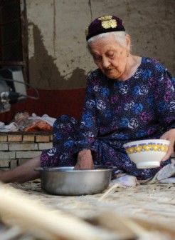 Oldest woman in the world? Alimihan Seyiti cooking food in her home in Shule county of Kashgar, northwest China's Xinjiang region