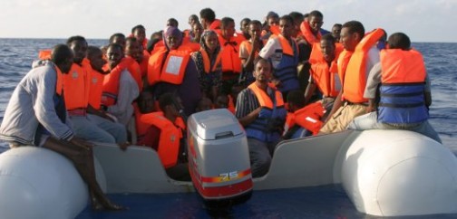 File Photo: A Malta Air Force handout photo dated 15 August 2009 shows would-be illegal immigrants being taken to Malta after being rescued from a sinking dinghy. 